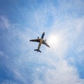 Below jet plane flying on sky Royalty Free Stock Photo