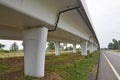 Below side of new long highway bridge across the field