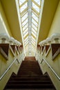 Staircase with lamps under glass ceiling Royalty Free Stock Photo