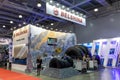 BELSHINA stand at the construction industry fair Bauma CCT Russia. Huge tires for heavy dump trucks. Moscow, Russia -