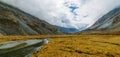 View from lake Akkem on mountain Belukha near board between Russia and Kazakhstan during golden autumn Royalty Free Stock Photo