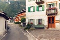 Beluno, Italy August 9, 2018: Auronzo di Cadore mountain village. Houses on the mountains. Royalty Free Stock Photo