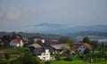 Belsinja Vas village foggy mountain Slovenia scenery Europe Royalty Free Stock Photo