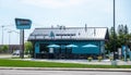 BEMIDJI, MN - 3 JUN 2023: Caribou Coffee building and vehicles