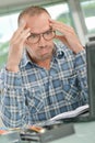 Bemused man at computer