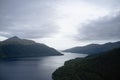 Ben Lomond aerial birdseye view from above loch in moody sunrise sky in the Highlands Scotland