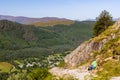 BEN NEVIS, SCOTLAND - SEPTEMBER 01 2021: Hikers making their way up the main track towards the summit of Ben Nevis on a hot, clear Royalty Free Stock Photo