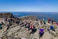 BEN NEVIS, SCOTLAND - SEPTEMBER 01 2021: Hikers on the summer of Ben Nevis on a hot, clear day. Ben Nevis is the tallest peak in Royalty Free Stock Photo