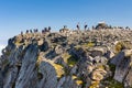 BEN NEVIS, SCOTLAND - SEPTEMBER 01 2021: Hikers on the summer of Ben Nevis on a hot, clear day. Ben Nevis is the tallest peak in