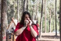 The bard - participant of the reconstruction `Viking Village` plays the harmonica in the camp in the forest near Ben Shemen in Isr