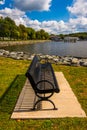 Bench along the shore of the North East River in North East, Mar