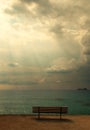 Bench on a beach in Thasos, Greece. Sea and sunset photography