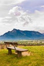 Bench with a beautiful mountain landscape view.
