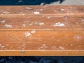 A bench in Bucharest covered with bird droppings