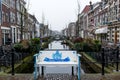 BENCH AND CANAL, Gouda, Netherlands - December 3, 2017: View of