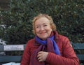 Bench in Central Park, New York: Elderly Lady Next to a Plaque: COME DANCE WITH ME!