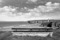 Bench on a cliff edge in black & white Royalty Free Stock Photo