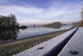 Frost on a tree bench by the river bank Royalty Free Stock Photo