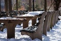 Bench covered with snow in Central Park in New York City. Royalty Free Stock Photo