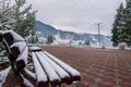 A bench covered with snow from Ortoaia, Dorna Arini, Suceava County, Romania Royalty Free Stock Photo