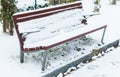 Bench covered with snow. Royalty Free Stock Photo