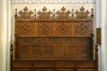 Bench with decorated wood carvings at St. Francis Church in Zagreb
