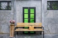 Bench with a designated smoking area sign above Royalty Free Stock Photo