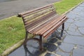 Bench detail in a boardwalk outdoors Royalty Free Stock Photo