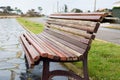 Bench detail in a boardwalk outdoors Royalty Free Stock Photo