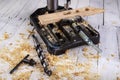 Bench drill for small carpentry work. Carpentry work in the workshop Royalty Free Stock Photo