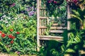 Bench in the flower garden. In the park Royalty Free Stock Photo