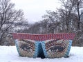 Bench in the form of glasses, an image of female eyes