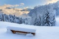 Bench with fresh snow in Austria Royalty Free Stock Photo