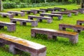 Bench and grass green wet after the rain morning in park Royalty Free Stock Photo