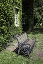 Bench and ivy house in local resort Royalty Free Stock Photo