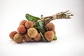 Bench of lychee on white background