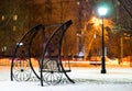 Bench in Moscow evening park background