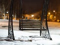 Bench in Moscow evening park background