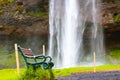 A bench near Skogafoss Waterfall in Iceland