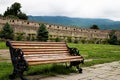 A bench in old monastery's yard Royalty Free Stock Photo
