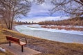 Bench Overlooking The Bow River Royalty Free Stock Photo