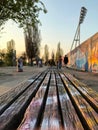 Bench In Park  At Graffiti Wall At Mauerpark In Berlin, Germany