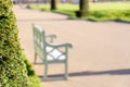 A bench in the park, quiet peaceful resting, copy space on right side.