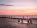 Bench on the Pier at Sunrise