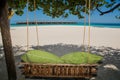 Bench with pillows at the topical beach at Maldives Royalty Free Stock Photo