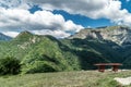 A bench for relaxation high in the mountains. Landscape view of Botev Peak (2376 m), Bulgaria