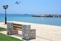 Bench by the Sea and Airplane Royalty Free Stock Photo