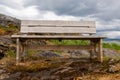 Bench by the sea bay in the fjord