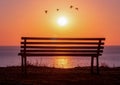 Bench with sea view at sunset Royalty Free Stock Photo