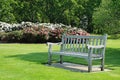 Bench seat in an english park in early Spring Royalty Free Stock Photo